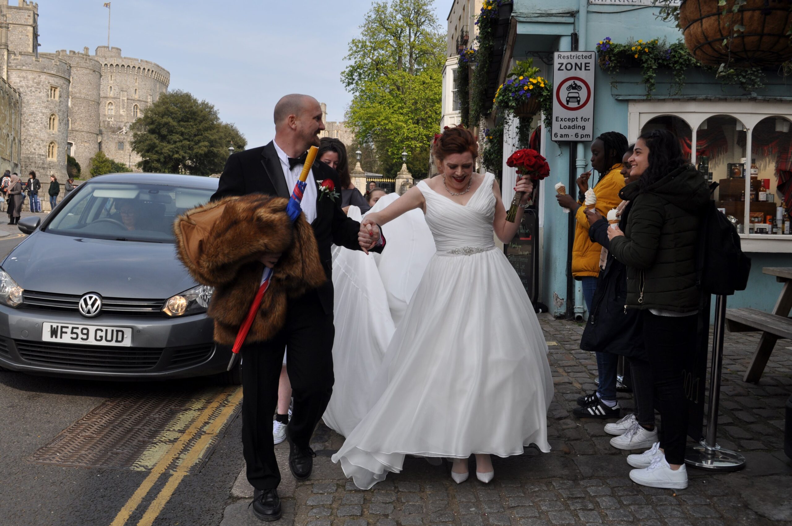 Bride and groom celebrating at Windsor wedding townhouse