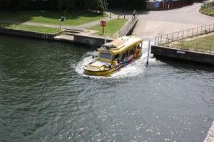 alt="Windsor Duck Tour splashing into river"